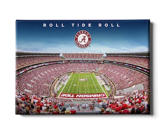 May include: A panoramic view of a packed football stadium with a blue sky and white clouds. The stadium is filled with fans wearing red and white. The words "Roll Tide Roll" are printed at the top of the image. A red circle with the words "Alabama Crimson Tide" and the letter "A" is in the center of the image.