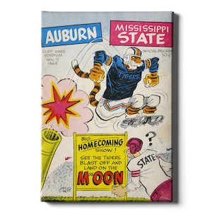 May include: A vintage program cover for a football game between Auburn and Mississippi State. The cover features a cartoon tiger wearing a blue jersey with the word "Tigers" on it, jumping over a pink cloud with a red star. The text "Big Homecoming Show! See the Tigers blast off and land on the Moon" is on a yellow sign.
