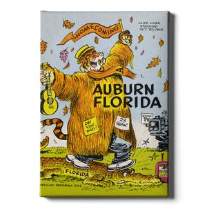May include: A cartoon illustration of a tiger wearing a brown coat and holding a guitar. The tiger is walking on a green field with a sign that says "HOMECOMING" and "AUBURN FLORIDA". The text "OFFICIAL PROGRAM - 50¢" is at the bottom of the image.