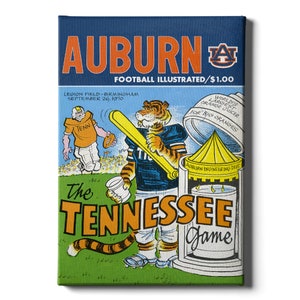 May include: A vintage illustration of a cartoon tiger holding a baseball bat, with the text "AUBURN FOOTBALL ILLUSTRATED/$1.00" and "The TENNESSEE Game" on a blue and green background.