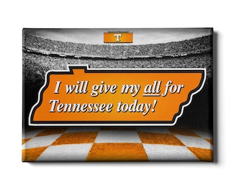 May include: A black and white image of a football stadium with a crowd of people. The image has a large orange Tennessee state outline with the text "I will give my all for Tennessee today!" in white. The image has a checkered orange and white pattern at the bottom.