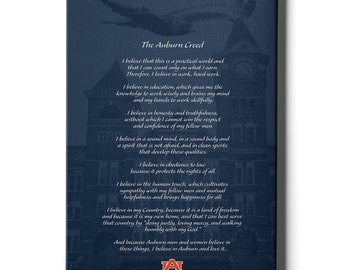 May include: A navy blue canvas print with the Auburn Creed text. The creed is a statement of values and beliefs. The text is in white and the background is a dark blue. The Auburn University logo is at the bottom of the print.