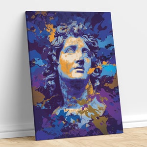 May include: Canvas art print featuring a stylized bust of a classical figure. The artwork uses a vibrant color palette of blues, purples, and gold, with a splatter paint effect. The subject's face is rendered in shades of gold and blue.