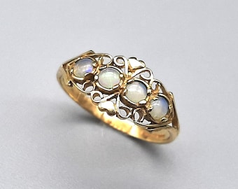 Anillo vintage de oro macizo de 9 quilates con ópalo y dos corazones, talla L 1/2, peso 1,4 g.