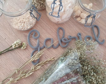 Wall decoration with first name in knitting for children's room