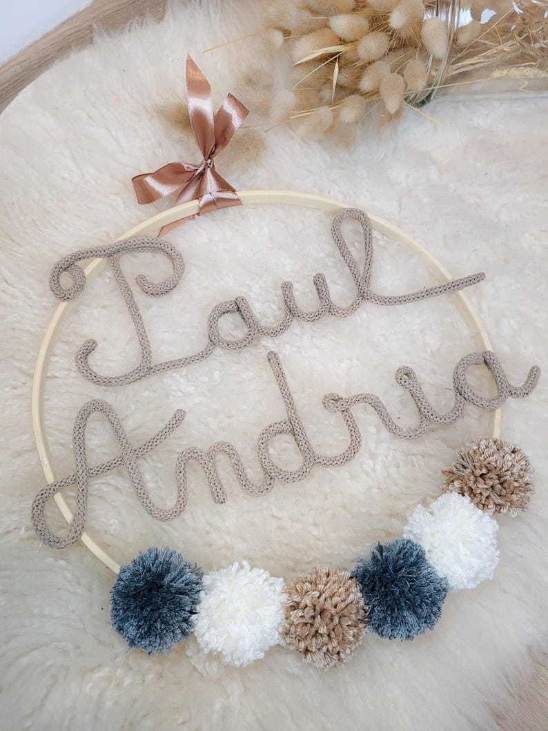 Baby room decoration personalized crown first name knitting pompoms image 1
