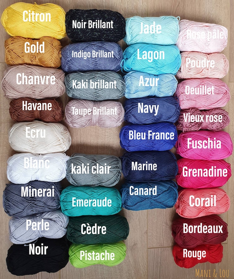 May include: A collection of yarn skeins in various colors, including citron, gold, chanvre, havane, ecru, blanc, mineral, perle, noir, noir brillant, indigo brillant, kaki brillant, taupe brillant, jade, lagon, azur, navy, bleu france, kaki clair, marine, canard, emeraude, c&egrave;dre, pistache, rose p&acirc;le, poudre, oeillet, vieux rose, fuschia, grenadine, corail, bordeaux, and rouge.