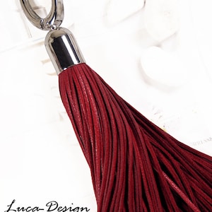 Leather tassel 18 cm (7 inch) leather pendant tassel leather fringe bobble pompom nappa leather bag pendant charm greyhound collar chain pendant