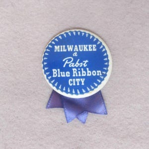 Milwaukee A Pabst Blue Ribbon City Advertising Celluloid Pinback Button with Ribbon
