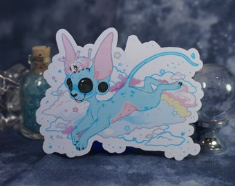 May include: A blue and pink cartoon creature with large eyes and a long tail, flying on a cloud with stars and a rainbow. The creature has a small pink creature on its head.