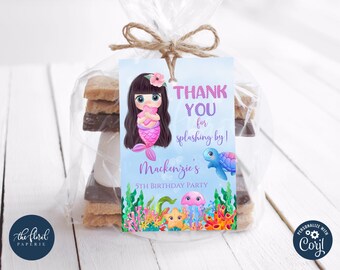 May include: Thank you for splashing by!  A mermaid with pink hair and a purple tail holds a pink seashell.  The text "Mackenzie's 5th Birthday Party" is on the tag.  The tag is attached to a bag of s'mores.