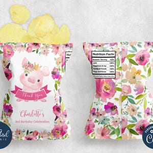 May include: Pink and white floral patterned chip bags with a pink pig wearing a crown and a banner that says "Thank you Charlotte's 3rd Birthday Celebration".