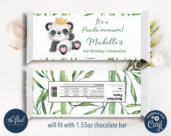 May include: A printable chocolate bar wrapper design featuring a panda bear wearing a crown and holding a bamboo shoot. The wrapper has a green and white bamboo leaf pattern and the text "It's a Panda-monium! Michelle's 3rd Birthday Celebration".