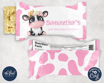 May include: Pink and white favor bag with a cow illustration wearing a flower crown. The bag says "Samantha's 5th Birthday Party".