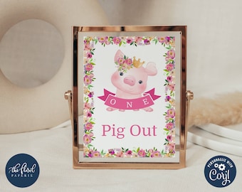 May include: A pink pig wearing a flower crown and a gold crown with a pink banner that says "ONE" and the text "Pig Out" on a white background with a floral border.