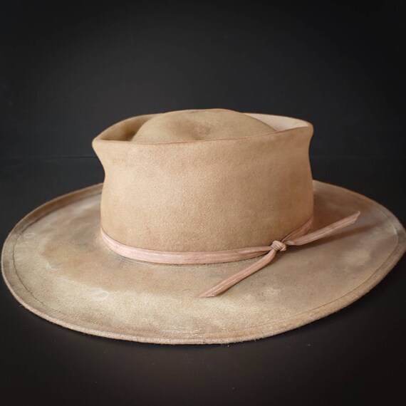 Cowboy Hat Size 7 3/8. the hateful Gun 