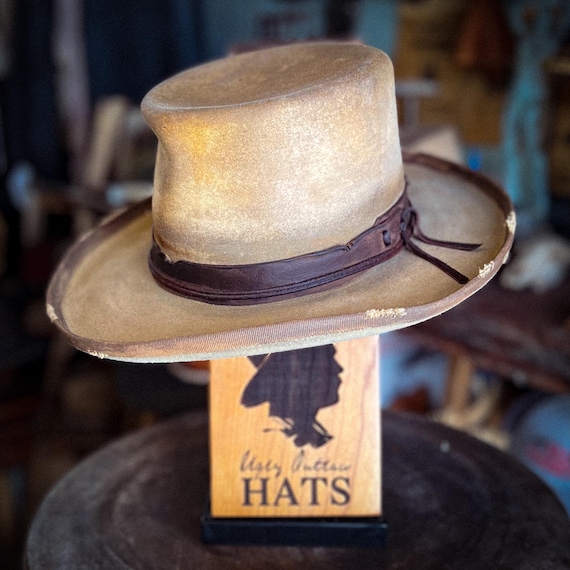 The “Shootin’ Champ” size 7 3/8 long oval from Ugly Outlaw Hats.