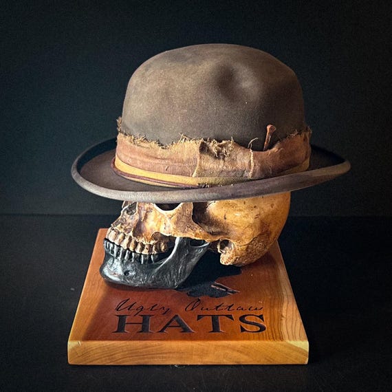 The “Man Who Chooses Violence” size 6 7/8 (55cm) from Ugly Outlaw Hats.