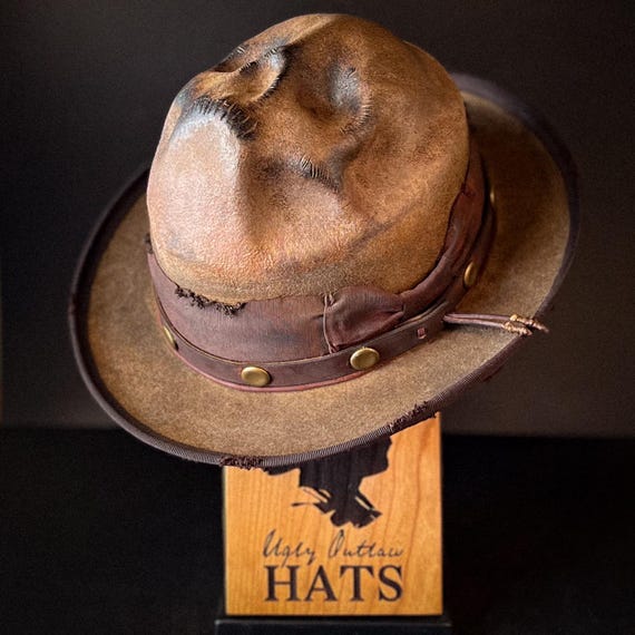 The “Skull of my Enemy” size 7 1/2 long oval from Ugly Outlaw Hats.