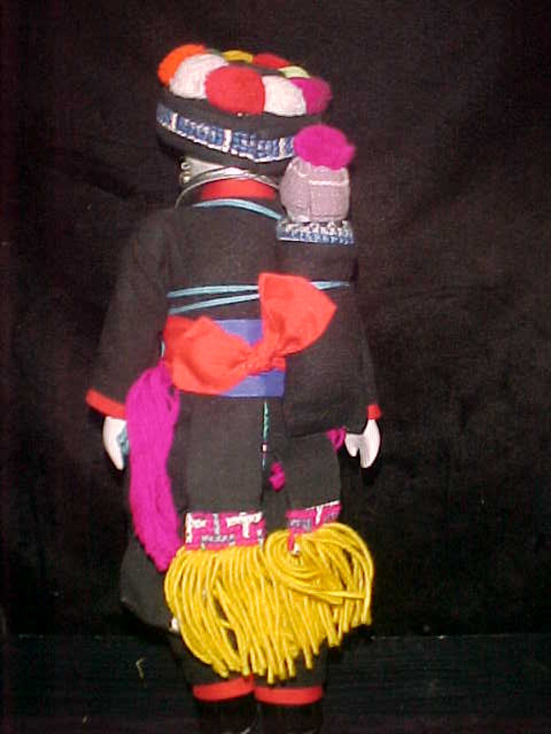 Traditional doll from Tibet or Nepal with local costume Ceramic
