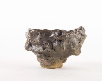 Yunomi 28, black raku bowl fired in a wood-fired oven.