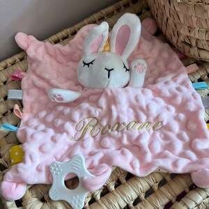 Personalized embroidered comforter with baby's first name. Soft rabbit plush to personalize for a nice birth gift. Birth gift comforter