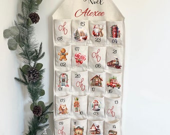 Kerstadventskalender van herbruikbare stof, gepersonaliseerd met de voornaam naar keuze. Voor een magisch aftellen!