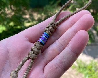 Paracord lanyard, Zeus Coyote Brown.  With titanium bead