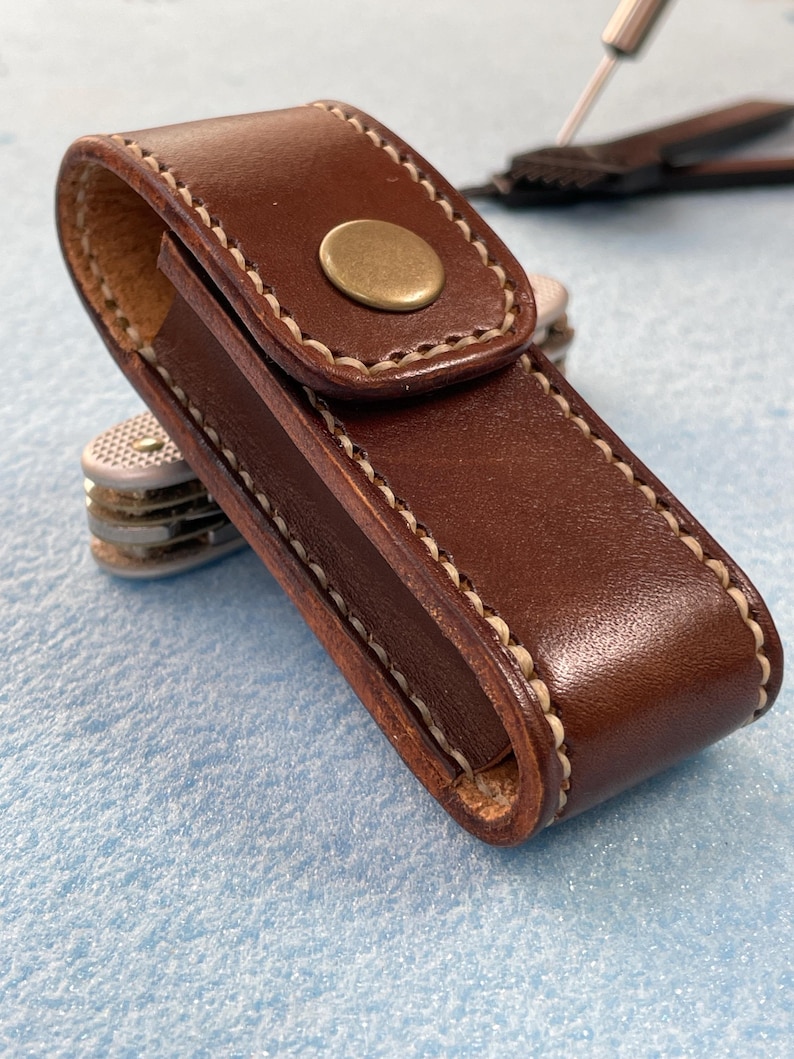 May include: A rustic wooden sign with the text "Welcome to our home" in white lettering. The sign features a distressed finish and a simple, inviting design, perfect for front door decor.