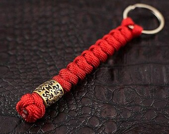 Paracord keychain, "Rondelle Scandinavia".  Hand-cast brass bead