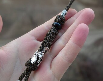 Spartan helmet , knife paracord lanyard . keychain