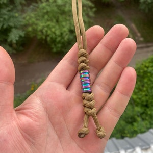 Paracord lanyard, Zeus Coyote Brown.  With two small titanium beads