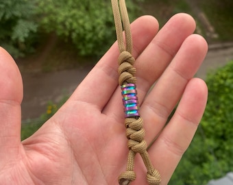 Paracord lanyard, Zeus Coyote Brown.  With two small titanium beads