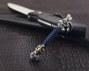 Paracord lanyard, "Knight".  Hand-cast brass bead