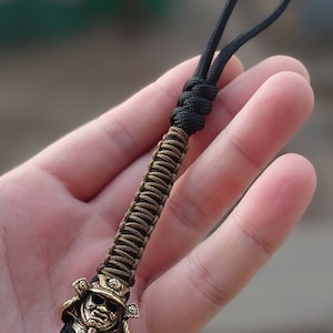 Paracord lanyard with  Samurai helmet bead ,Hand-molded brass bead/Paracord keychain/ Custom knife paracord lanyard bead ,handmade jewelry