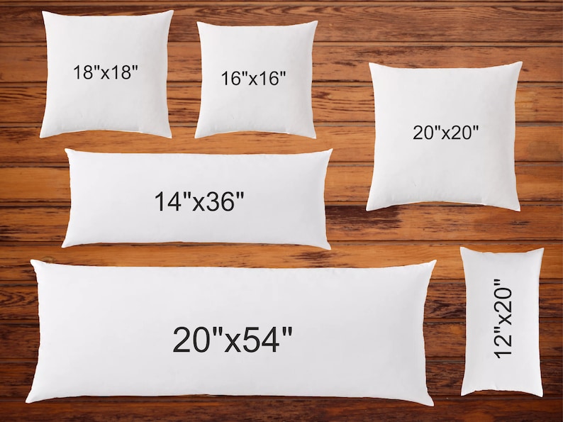 May include: Five white pillow inserts of different sizes, including 18"x18", 16"x16", 20"x20", 14"x36", and 20"x54", displayed on a wooden surface.