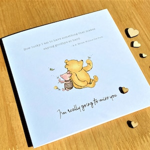 6 x 6 inch Winnie the Pooh Miss You Card featuring a classic Winnie the Pooh image, a laser-cut wooden heart and an AA Milne quote