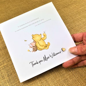 6 x 6 inch Handmade Winnie the Pooh Thank you teacher card. Features a laser cut wooden heart, an AA Milne quote and a classic Winnie the Pooh image. This card is personalised