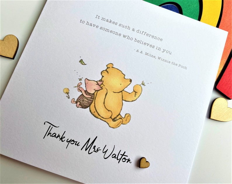 6 x 6 inch Handmade Winnie the Pooh Thank you teacher card. Features a laser cut wooden heart, an AA Milne quote and a classic Winnie the Pooh image. This card is personalised