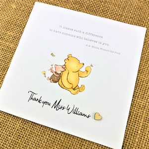 6 x 6 inch Handmade Winnie the Pooh Thank you teacher card. Features a laser cut wooden heart, an AA Milne quote and a classic Winnie the Pooh image. This card is personalised