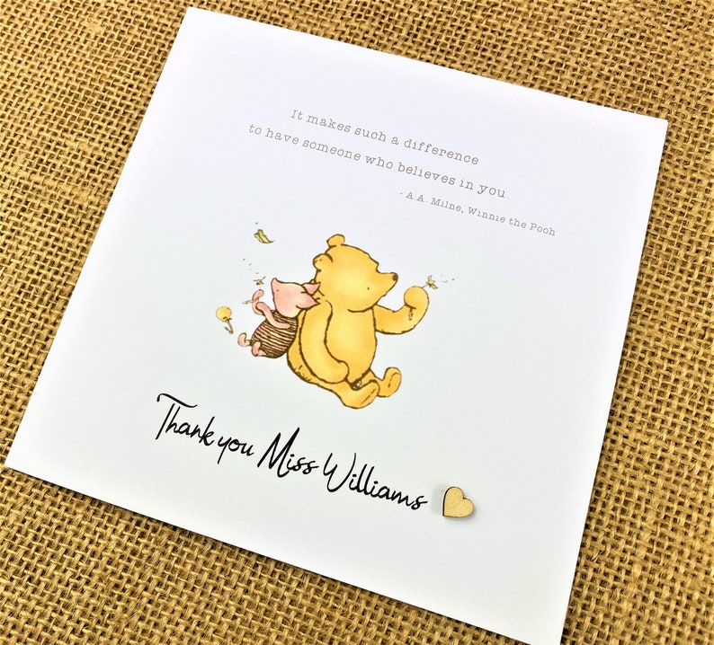 6 x 6 inch Handmade Winnie the Pooh Thank you teacher card. Features a laser cut wooden heart, an AA Milne quote and a classic Winnie the Pooh image. This card is personalised