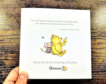 May include: A Winnie the Pooh and Piglet illustration on a white card with the text "You are braver than you believe, stronger than you seem and smarter than you think. - A.A. Milne, Winnie the Pooh" and "Good luck at the University of Durham Darcie".
