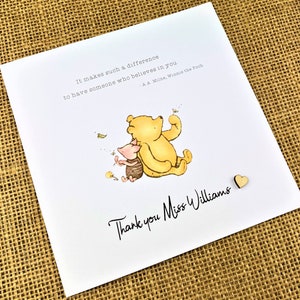 6 x 6 inch Handmade Winnie the Pooh Thank you teacher card. Features a laser cut wooden heart, an AA Milne quote and a classic Winnie the Pooh image. This card is personalised