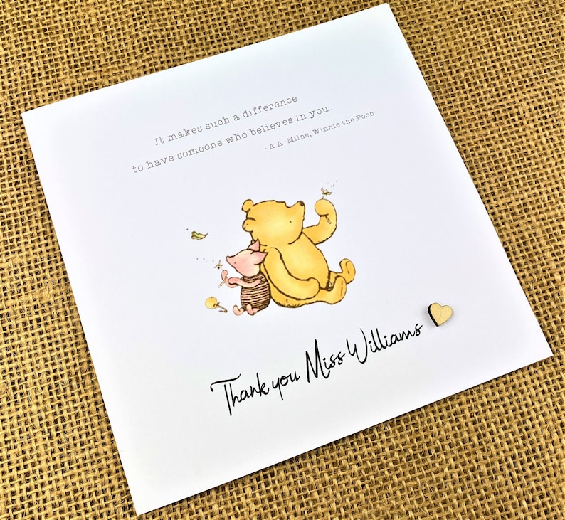 6 x 6 inch Handmade Winnie the Pooh Thank you teacher card. Features a laser cut wooden heart, an AA Milne quote and a classic Winnie the Pooh image. This card is personalised