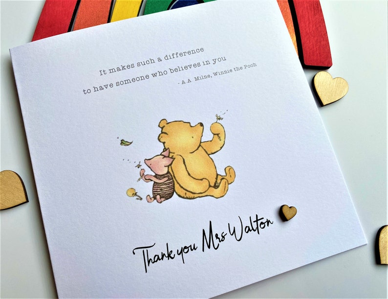 6 x 6 inch Handmade Winnie the Pooh Thank you teacher card. Features a laser cut wooden heart, an AA Milne quote and a classic Winnie the Pooh image. This card is personalised