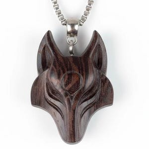 Handmade Wenge Wooden Wolf Pendant: Exotic Animal Necklace
