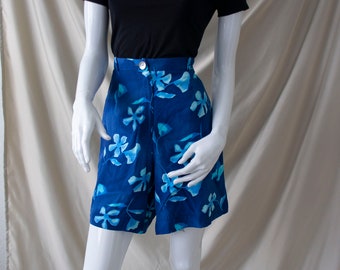 vintage | Emmanuelle Paris | blue floral high-waist shorts | size small | hawaiian style | mother of pearl button | Made in France
