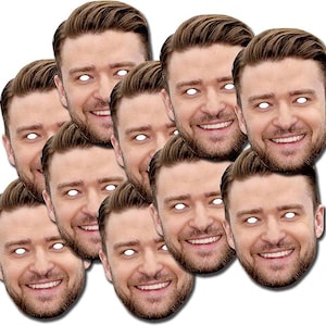May include: A collection of multiple identical face masks featuring a photographic print of a man with short brown hair, a groomed beard, and a smiling expression. Each mask has die-cut white eye holes and a realistic skin tone finish.