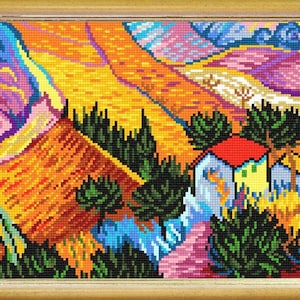 May include: A framed cross-stitch embroidery depicting a vibrant landscape with rolling hills in shades of orange, yellow, and purple, featuring a small house with a red roof, green trees, and a winding path, all rendered in a pixelated style.