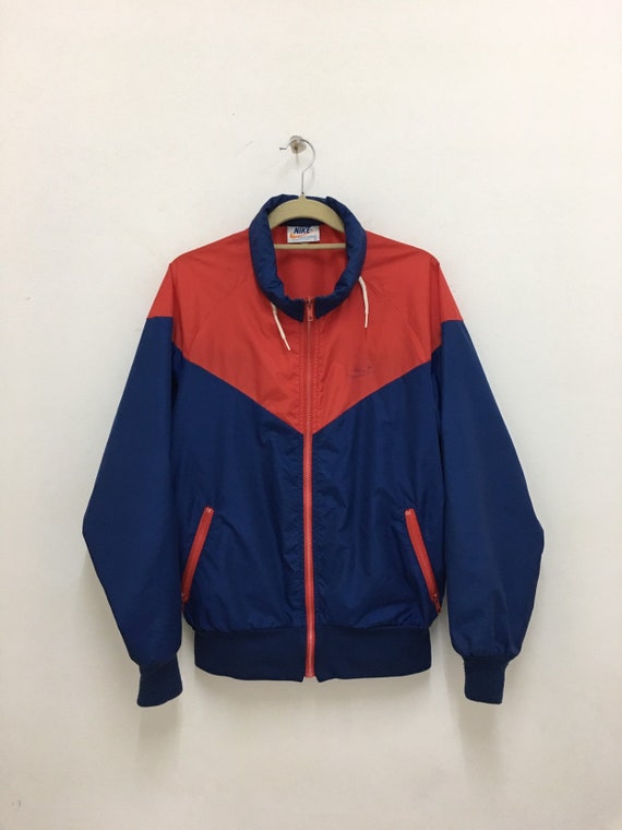 red and navy nike windbreaker